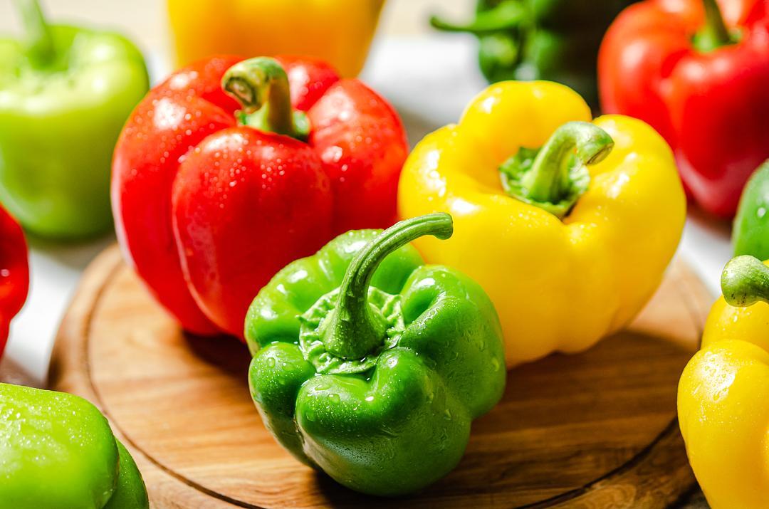 Fresh Organic Rainbow Bell Peppers Red, Yellow, Orange, and Green by RawJoy Farm